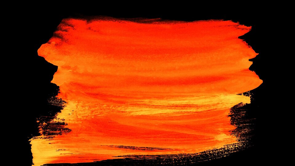 Abstract red, orange and yellow brush strokes on a black background.